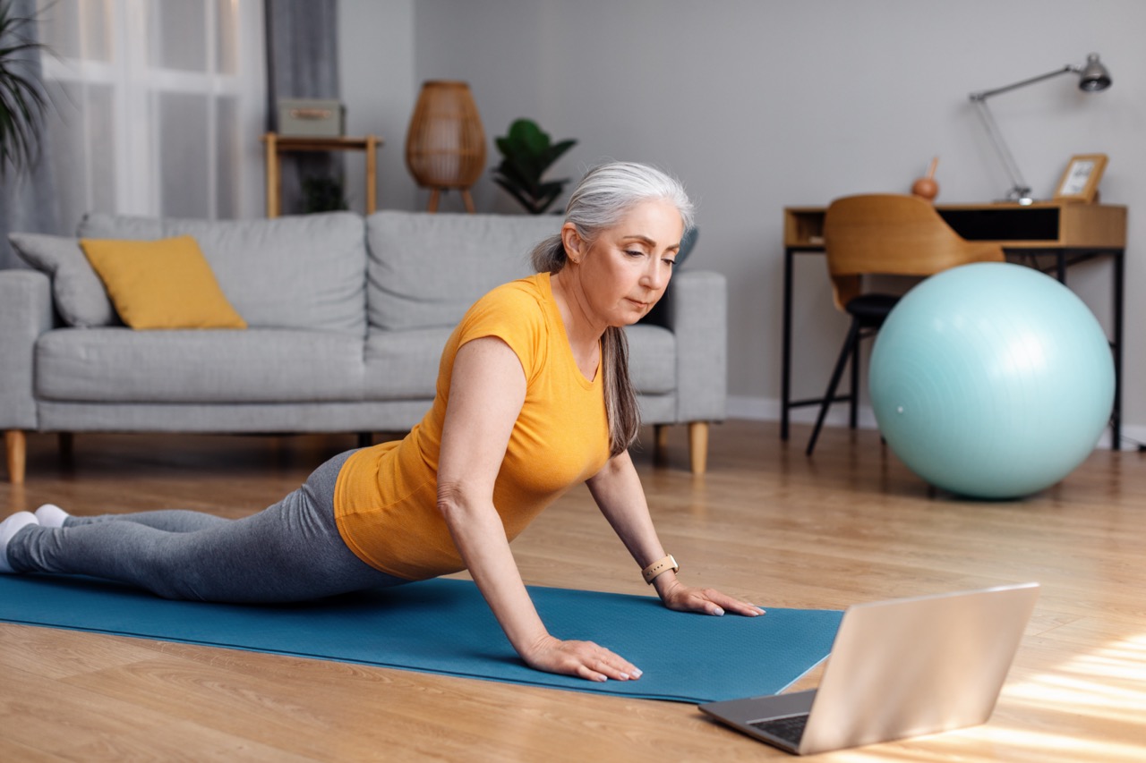 A person doing yoga on a mat