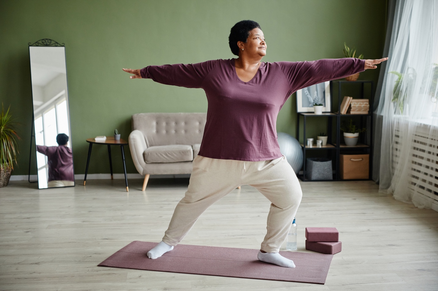 A person doing yoga in a living room