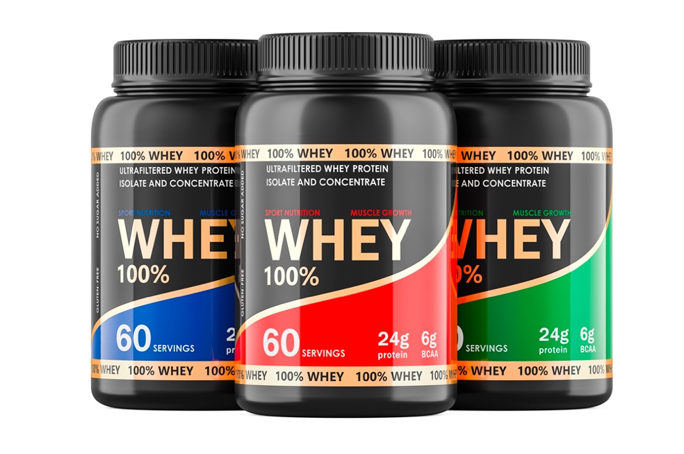 A group of containers of whey protein